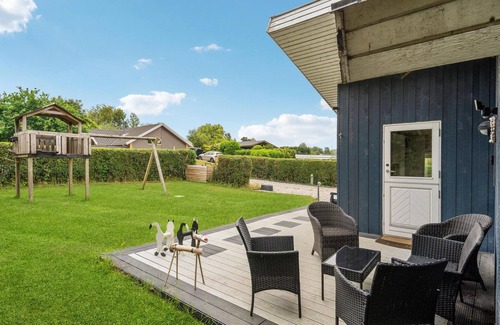 Pøt Strandby House | Spend a relaxing vacation in this beautiful cottage near the beach.