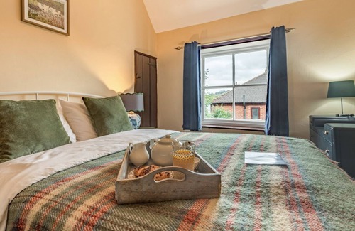 Tunstall Cottage | Spend an evening relaxing by the wood burner after a day exploring the local walks and attractions.