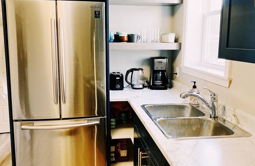 Fredericton Apartment | Spin & Sip | Dog-Friendly Vinyl Vibes Downtown