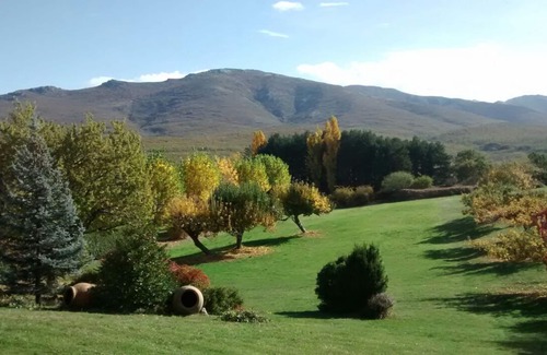 Riaza House | Splendid villa with large garden and game court in cool climate