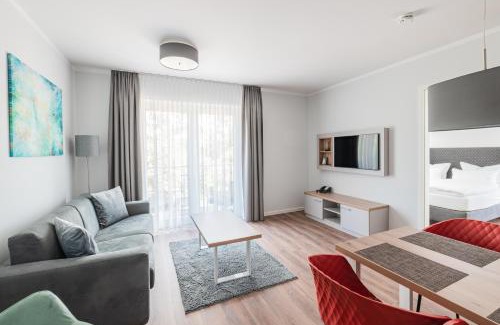 Neuruppin Apartment | Sporthotel Neuruppin - Apartmenthaus mit Ferienwohnungen