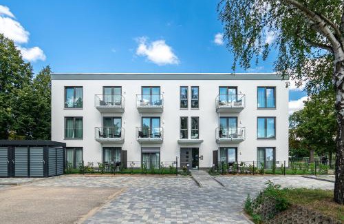 Neuruppin Apartment | Sporthotel Neuruppin - Apartmenthaus mit Ferienwohnungen