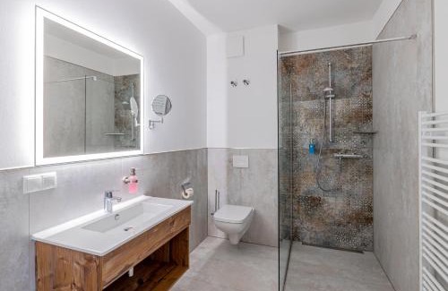 Neuruppin Apartment | Sporthotel Neuruppin - Apartmenthaus mit Ferienwohnungen
