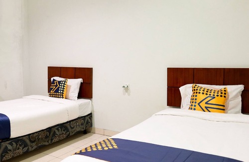 Padang Hotel | SPOT ON 2182 Al-ghani 2 Syariah