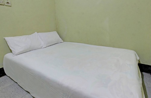 Kecamatan Janapria Hotel | SPOT ON 92882 Penginapan 3 Bersaudara Near Pasar Sengkol