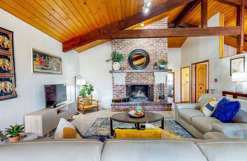 Centralia House | Sprawling and colorful lakefront home with patio