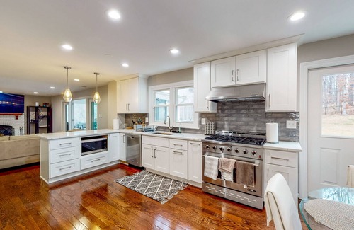 Potomac House | Sprawling Estate with Private Tennis Court & Outdoor Kitchen, Wood Fireplaces