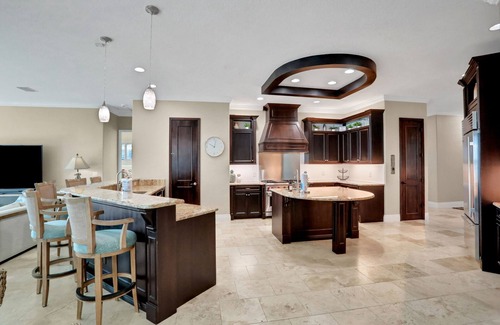 Edgewater House | Sprawling intercoastal home with boat lifts, pool and hot tub