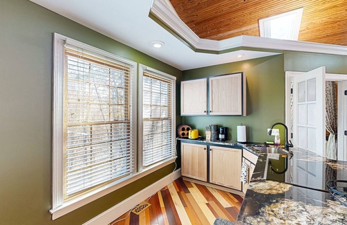 Chester County House | Sprawling property with a pool, hot tub, fireplaces, grill, retro bedroom, & AC