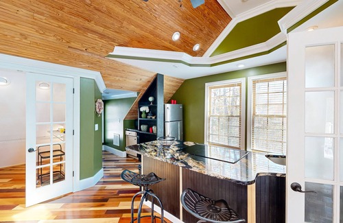 Chester County House | Sprawling property with a pool, hot tub, fireplaces, grill, retro bedroom, & AC