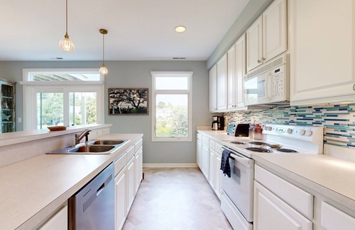 Rehoboth Beach Condo | Spring Lake Condo with patio, free WIFI, W/D, shared pool