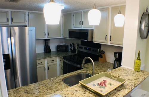 St. Augustine Beach Condo | St Augustine Beach Island Escape 2 bed,2 bath,1st floor condo steps to the beach