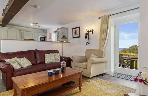 New Quay Cottage | STABLE COTTAGE, character holiday cottage, with open fire in New Quay