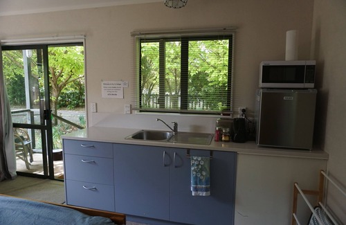 Greytown Cottage | Stand alone cottage in tranquil garden, with balcony, pergola, SkyTV, free Wifi