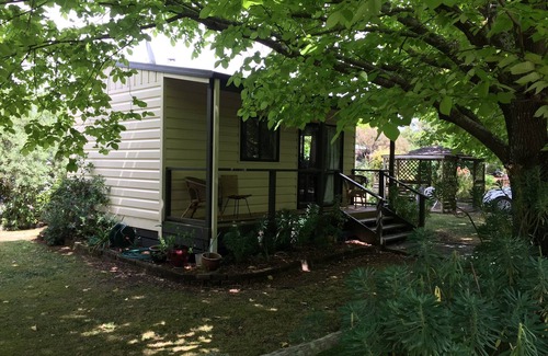 Greytown Cottage | Stand alone cottage in tranquil garden, with balcony, pergola, SkyTV, free Wifi
