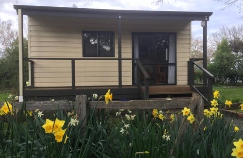 Greytown Cottage | Stand alone cottage in tranquil garden, with balcony, pergola, SkyTV, free Wifi