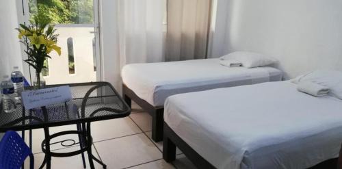 Santa Maria House | Standard room with two single beds for relaxed stay
