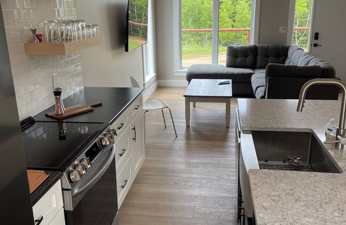 New London House | Stanley Bridge Retreat