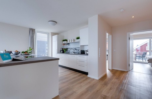 Kappeln Apartment | StarBoard: Baltic Sea vacation apartment with Baltic Sea view, two terraces, sauna & fireplace.