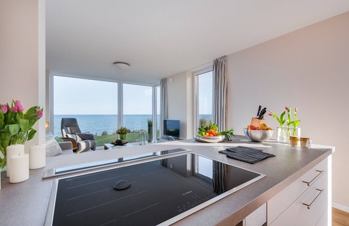 Kappeln Apartment | StarBoard: Baltic Sea vacation apartment with Baltic Sea view, two terraces, sauna & fireplace.