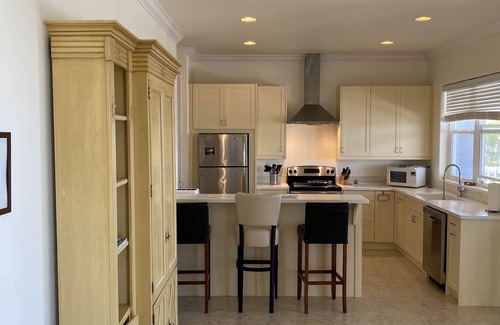 Treasure Cay House | Starboard House: Main Unit in Canalfront Home close to beach