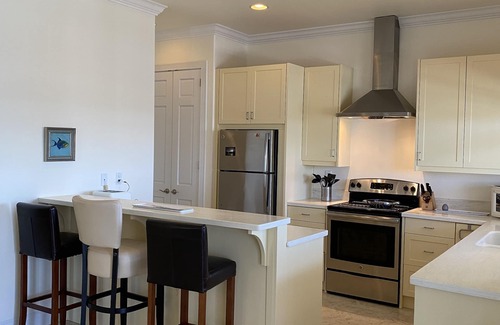 Treasure Cay House | Starboard House: Main Unit in Canalfront Home close to beach