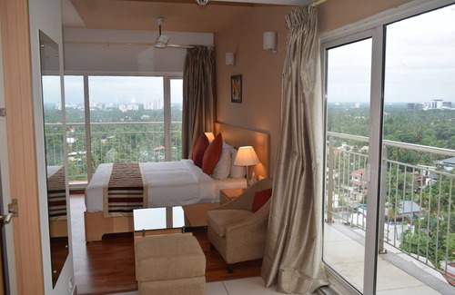 Maradu Hotel | Starlit Suites