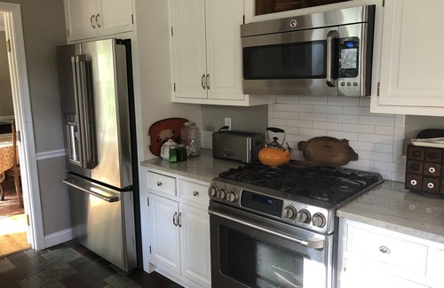 Annapolis House | Stately Brick Ranch On Corner Lot with Private Backyard for Entertaining
