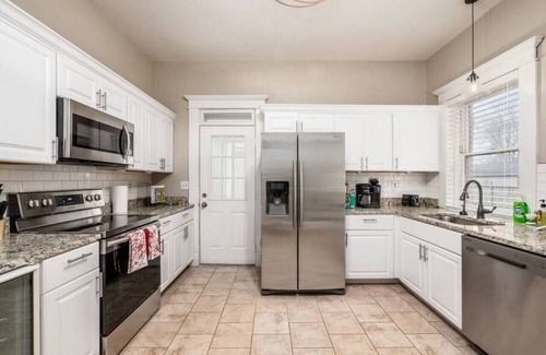 Olde Towne East House | Stately Executive Home with Modern Amenities