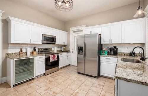 Olde Towne East House | Stately Executive Home with Modern Amenities