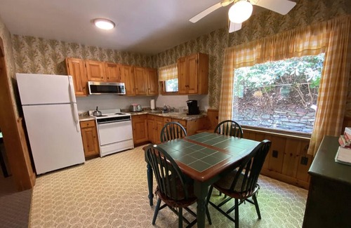 Greentown Cottage | Stay at the Little Red Cottage and enjoy Lake Wallenpaupack in the Poconos.