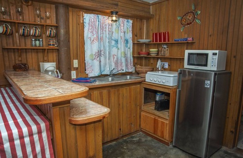 Antoneys Cay Apartment | Stay & Dive or Snorkel! Rustic, beach side apartment, steps from the waters edge