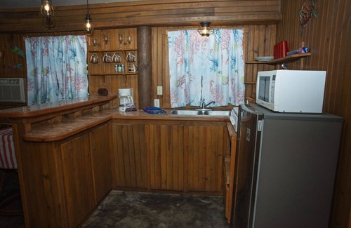 Antoneys Cay Apartment | Stay & Dive or Snorkel! Rustic, beach side apartment, steps from the waters edge