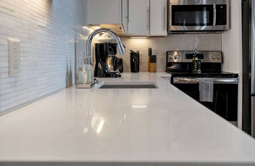 Faubourg Marigny Hotel | Stay in the center of the action with this charming 1-bedroom retreat located on the historic Esplanade Avenue. This unique space combines timeless New Orleans elegance with modern comfort, offering a serene escape just steps from Frenchmen Street.