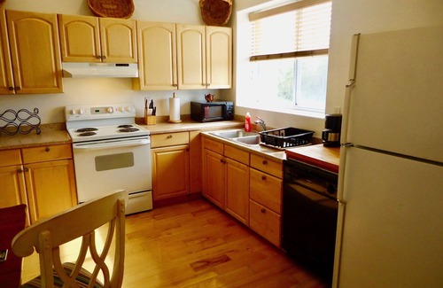Suttons Bay Apartment | Stay in the heart of Leelanau county wine tasting region. Views to Traverse Bay
