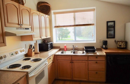 Suttons Bay Apartment | Stay in the heart of Leelanau county wine tasting region. Views to Traverse Bay