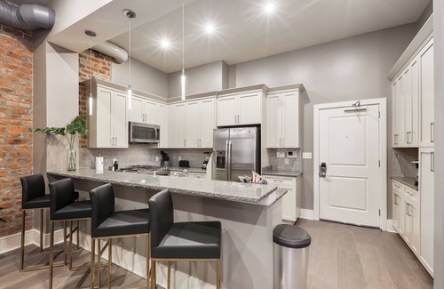 Central Business District Condo | 🎶 STAY LUXE in This 2 STORY DOWNTOWN GEM with Personal Balcony Waiting for you! 🎶 | The Zydeco