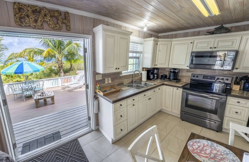 Spanish Wells Cottage | Stay Right On The Beautiful White Sand Beach - Free Golf Cart and Kayaks