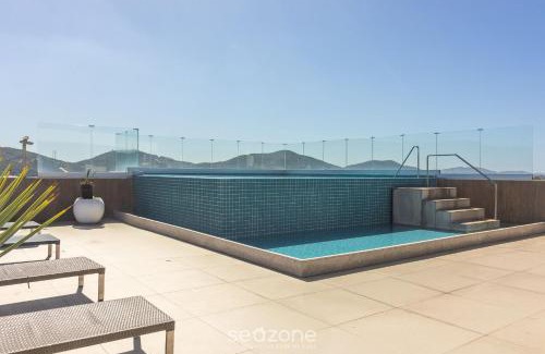 Passagem Apartment | Stay with pool and sauna just steps from the beach in Cabo Frio - HSC