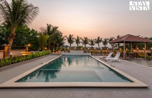 Ulhasnagar Villa | StayVista at Aura Farmstay with Pool & Lawn