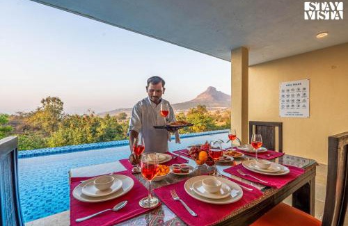 Javan Villa | StayVista at Beyond Infinity with Hill View, BBQ