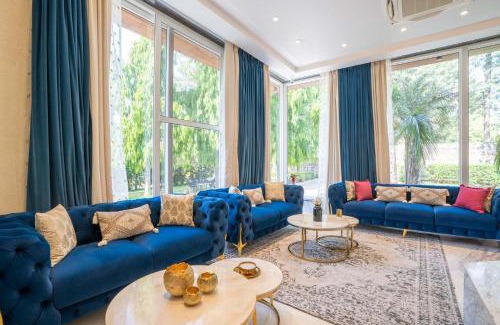 New Delhi Villa | StayVista at Estate 10 by Tarika - 4BR with Outdoor Pool in Delhi