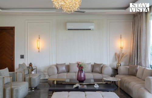 Gurugram Villa | StayVista at Olive Farms with Lawn, Pool, Bonfire & Hill Views
