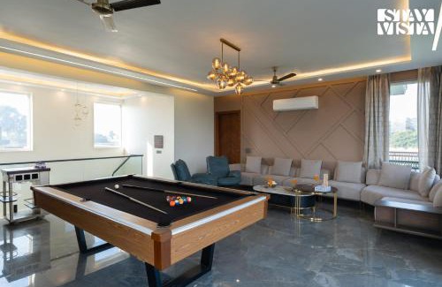 Gurugram Villa | StayVista at Olive Farms with Lawn, Pool, Bonfire & Hill Views
