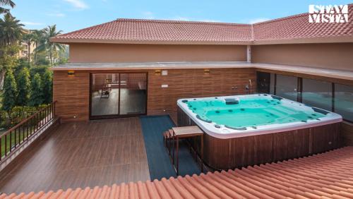 Vedic Village Villa | StayVista at Simply Beige with Jacuzzi, Wi-Fi, BBQ