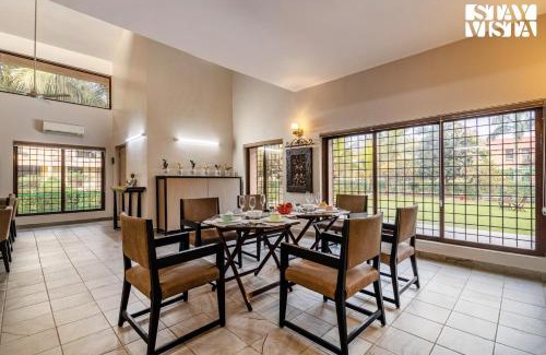 Vedic Village Villa | StayVista at Simply Beige with Jacuzzi, Wi-Fi, BBQ