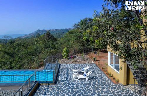 Paud Villa | StayVista at The Chirping Villa with Infinity Pool