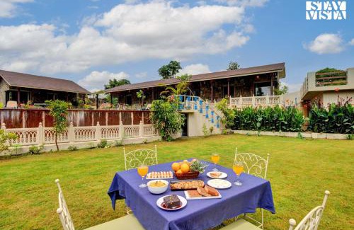 Udaipur District Villa | StayVista at The Earthen Boutique with Spacious Pool, Terrace, Lawn & Games