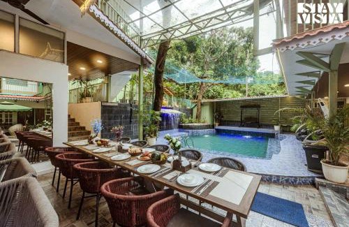 Saipem Villa | StayVista at The Green Post with BBQ, Pool, AC