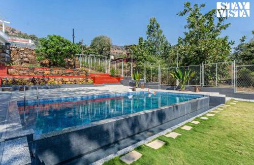 Panhala Villa | StayVista at The Redstone Villa with Bar, Lawn & Pool